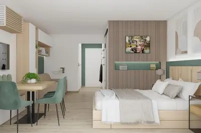 a bedroom with a bed and a table and chairs at ZEN & COSY - CARRÉ d'OR - Hyper centre - Plage in Nice