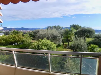 a balcony with a view of a garden at Nice Absea Belles Terres C in Nice