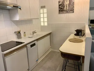 a small kitchen with a counter and a sink at ApartHotel Riviera - Cocon de Gilly - Old Town Promenade des Anglais in Nice