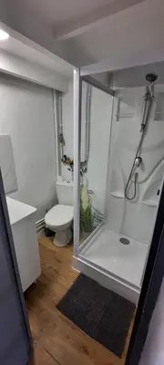 a bathroom with a shower and a toilet at Studio coin nuit terrasse à 5 minutes de la plage N1 in Saint-Laurent-du-Var