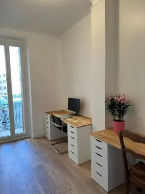 a room with a desk with a computer on it at Cosy Nice appartement in Nice