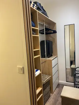 a room with a closet with a mirror at Denis&kanya in Nice