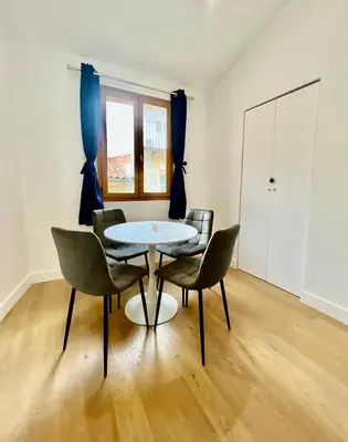 a dining room with a table and chairs at Old Town Lovely Apartment in Nice in Nice