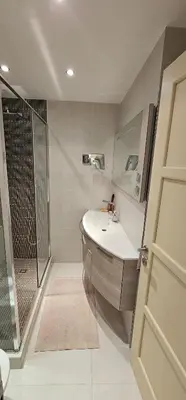a bathroom with a sink and a shower at bella d'azur in Nice