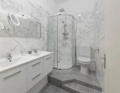 a bathroom with a shower and a toilet and a sink at #18 Rossetti Suite 2 Bedrooms , Central Old Nice/AC in Nice