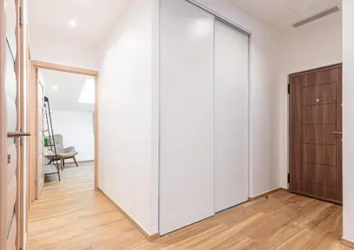 a large white closet in a room with a mirror at Trois pièces cozy n14 in Nice