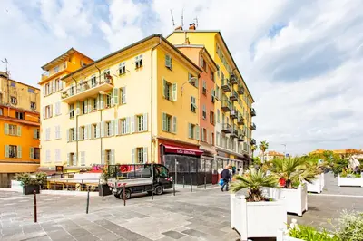 a yellow building on a street in a city at L26 Old Town central 5mins walk to Sea front AC WIFI in Nice