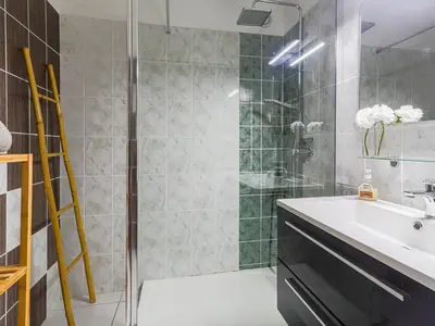a bathroom with a shower and a sink at Apartment Les Balcons de Battisti by Interhome in Nice