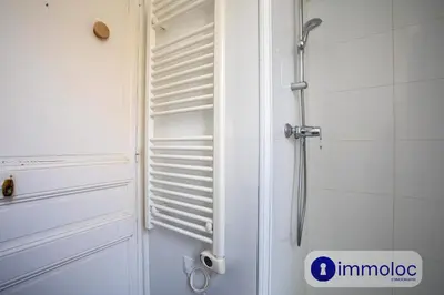a bathroom with a shower and a white door at Apartment with 2 bedrooms Quartier Libération in Nice