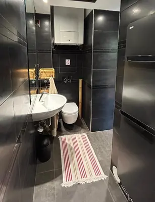 a bathroom with a sink and a toilet at Villa Nice in Nice