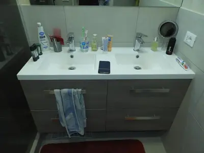 a bathroom counter with a sink with a mirror at F4 6 Couchages Terrasse Proche Centre in Nice
