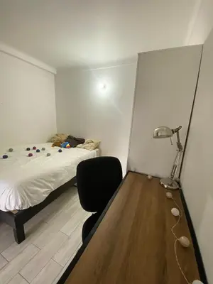 a bedroom with a bed and a desk with a chair at Nice apartment - Valrose - Cosy & Chill in Nice