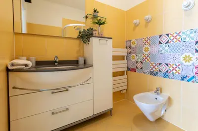 a bathroom with a sink and a toilet at #13 Orange suite AC Wifi Balcony 3mins walk sea front in Nice