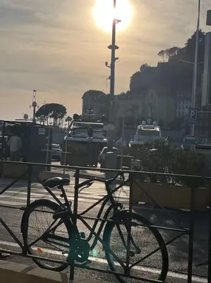 a bike is parked next to a fence at Nice Proche Mer in Nice