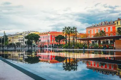 a city with buildings and a body of water at Art Studio Nice in Nice