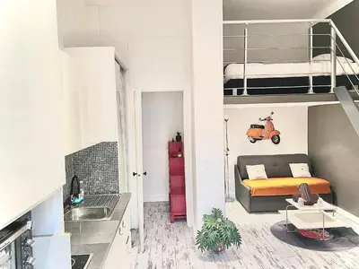 a small apartment with a loft bed and a small bedroom at Malyandco in Nice