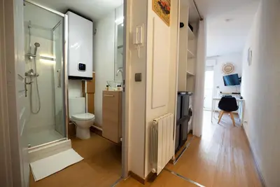 a bathroom with a shower and a toilet and a sink at Cocon Urbain - Près de la Gare in Nice