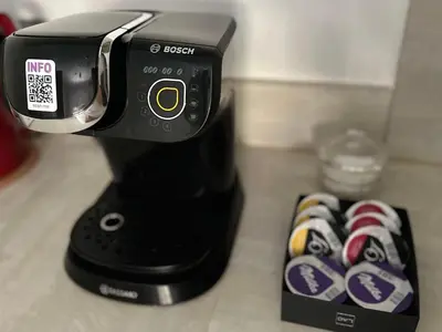 a black coffee maker sitting on top of a counter at Cosy 2 p,à Deux Pas de la Plage, Calme-Parking in Nice