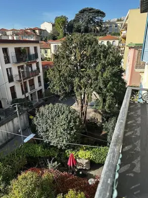 an overhead view of a garden with a tree and buildings at Chic Renovated Home - Nice Libération - Entire 2BR 2BA Apartment or Private Rooms with Private Bathrooms - AC and Garage on request in Nice
