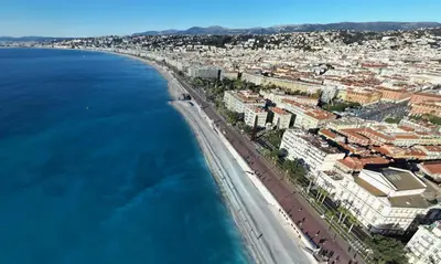 an aerial view of a city and the ocean at Charmant 2 pièces in Nice