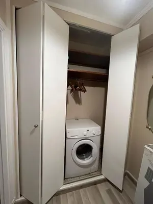 a closet with a washing machine and a washer at Studio à deux pas de la mer in Nice