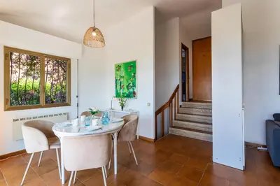 a dining room with a table and chairs at VILLA LA PETITE RESERVE VI4416 By Riviera Holiday in Èze