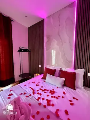 a bedroom with a bed covered in red roses at Luxurious Apartment - Seaside - Spa Bath - WiFi - AC in Nice