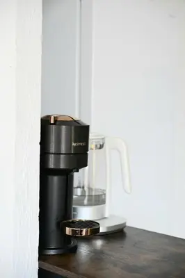 a coffee maker sitting on top of a counter at The Seaside Serenity -NEW AC equipped - Calm with Bay View - Heart of Villefranche in Villefranche-sur-Mer
