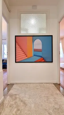 a painting on a wall in a room at Jazzy et Spacieux Appartement Prom des Anglais in Nice
