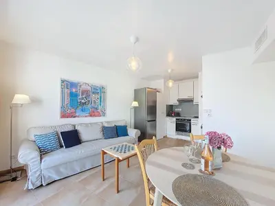 a living room with a couch and a table at Nestor&Jeeves - VAGUE AZUR - Balcony - Central in Nice