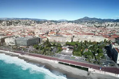 an aerial view of a city and the beach at Maison Albar - Le Victoria in Nice