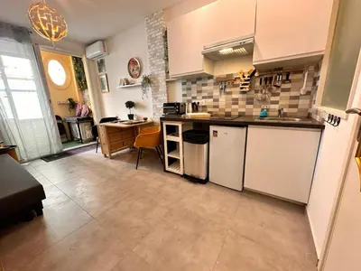 a kitchen with a sink and a counter top at Studio Coeur Delille FSHH in Nice