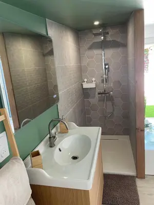 a bathroom with a sink and a shower at La chambre de Cleron in Saint-Laurent-du-Var