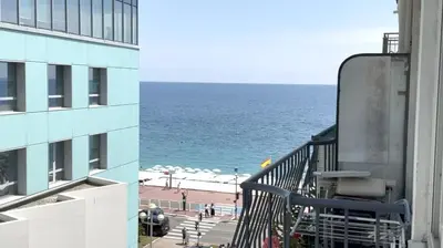 a view of the ocean from a balcony of a building at #19 Lenval - Balcon Lenval Sea View with AC Promenade des Anglais in Nice