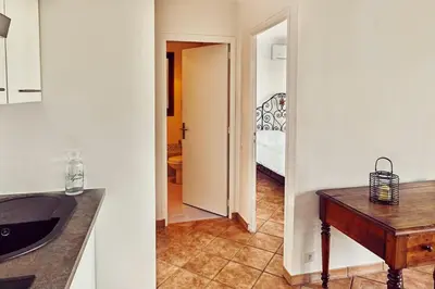 a kitchen with a sink and a hallway at Best View ever! in Èze