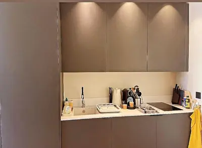 a kitchen with a sink and a counter top at Masséna street, 2 rooms balcony in Nice