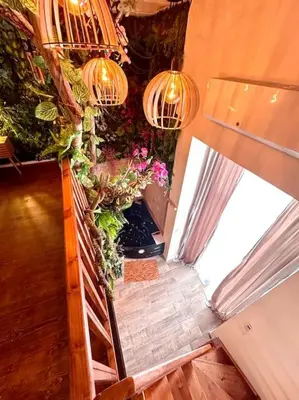 an overhead view of a hallway with flowers and lights at Jungle avec Jaccuzi au coeur de Nice in Nice