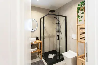 a bathroom with a shower and a toilet at #51 1BDR Massena,central 5 min to the beach AC in Nice