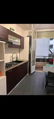 a kitchen with a sink and a counter top at appartement 10mn à pied plage promenade in Nice