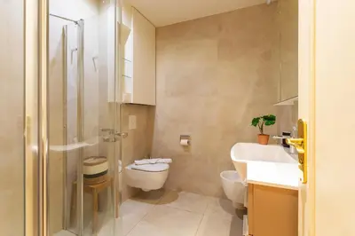 a bathroom with a toilet and a sink at LE CAPITOL 2 AP4421 By Riviera Holiday Homes in Nice