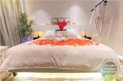 a bedroom with a bed with a stuffed animal on it at Riviera Bliss in Nice