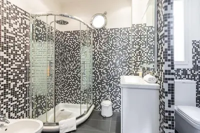 a bathroom with a shower and a sink and a tub at PENTHOUSE 2Bedroms 6pax- Views 45m2 Terrace in Nice