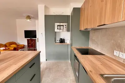 a kitchen with a sink and a counter top at Le Villermont - Liberation Centre Ville in Nice