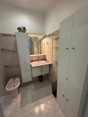 a bathroom with a sink and a toilet at Beau T2 proche Negresco in Nice