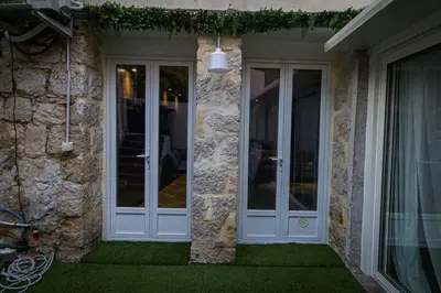a front door of a house with green grass at Nissa la Bella in Nice