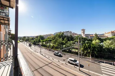a view of a street with cars on the road at 2 Bdr Panoramic View on Gardens in Nice