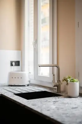 a kitchen counter with a sink and a window at La Suite Lascaris PORT of NICE #renovated in Nice