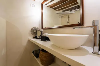 a bathroom with a large white bowl sink on a counter at LA CASETTA DI AZZURRA AP4427 By Riviera Holiday Homes in Villefranche-sur-Mer