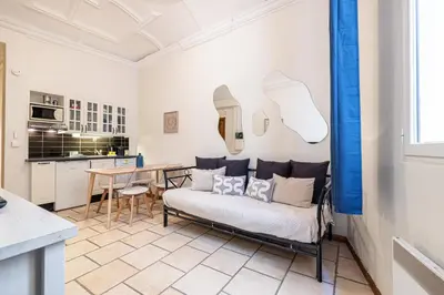 a living room with a couch and a table at 2 Bdr Heart Old Town Nice in Nice
