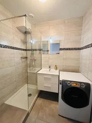 a small bathroom with a toilet and a tiled floor at Heart of the Old City - Nice in Nice